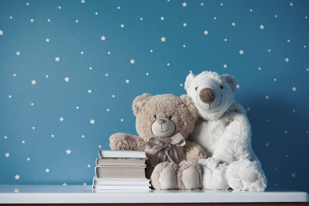 istock two toys with books in room 1169380986