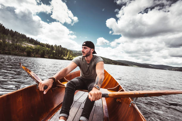 istock man rowing in the lake 1169383428