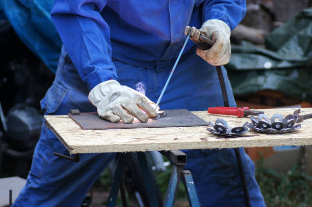 istock Metalworkers welders at work in industry 1169386133
