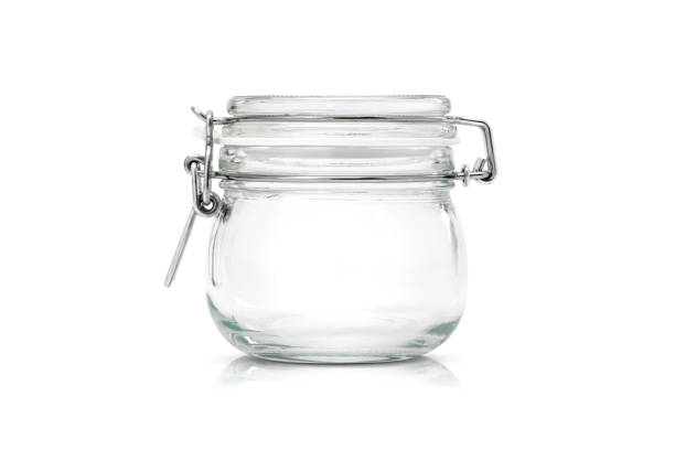 istock Transparent glass jar for kitchenware isolated on white background 1169386437