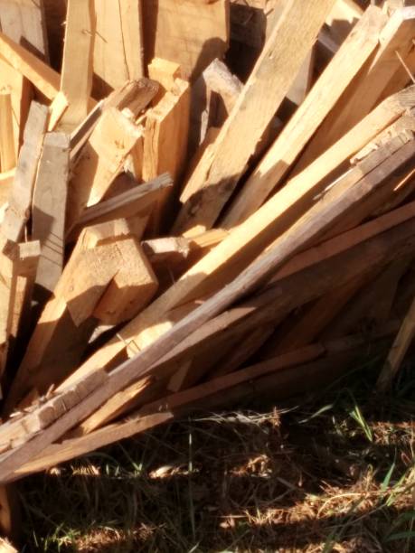 istock Construction waste wooden planks and whetstones left after the construction work of carpenters, prepared for waste for recycling 1169395591