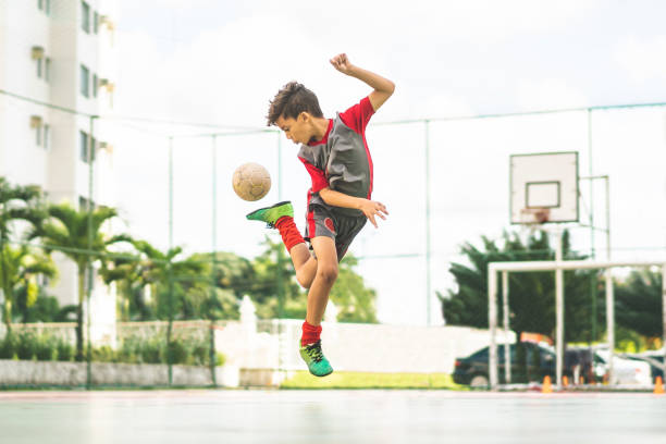 Futsal Soccer - Sport, Boys, Sport Court, Skill, Motion football socks stock pictures, royalty-free photos & images