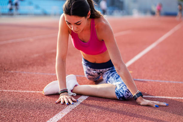 istock Athlete Woman Preparing For Run 1169402189