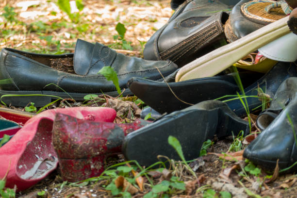 istock Old Shoes Abandoned 1169402239