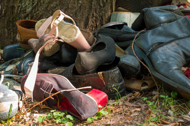 istock Old Shoes Abandoned 1169402246