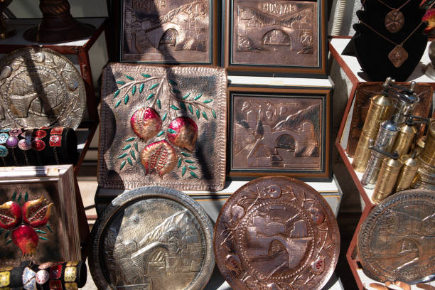 Mostar, Bosnia and Herzegovina - July 11, 2019: Copper product as souvenir for visitors and tourists in Old Town Mostar.