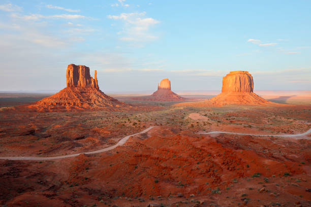 Monument Valley in Navajo County, Tribal Park, Arizona Landscape of Monument Valley, in the desert of the American Southwest in Arizona, USA. the mittens monument valley stock pictures, royalty-free photos & images