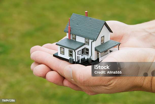 Concept Real Estate Hands Holding A House Stock Photo - Download Image Now - Agreement, American Culture, Aspirations