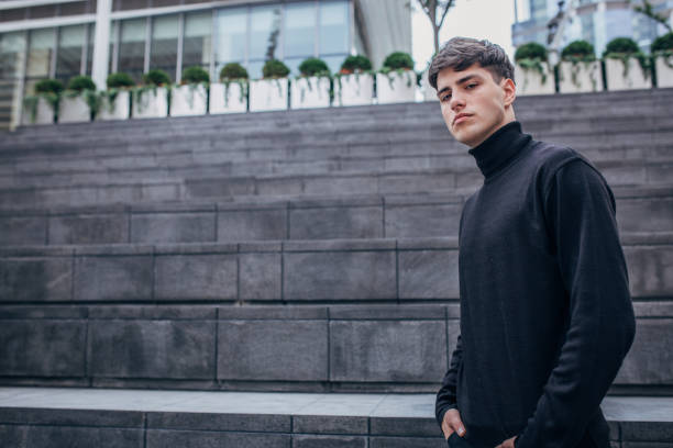 istock Handsome man in black clothing 1169413120