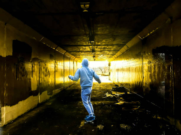istock Skateboarding Through A Tunnel 1169416054