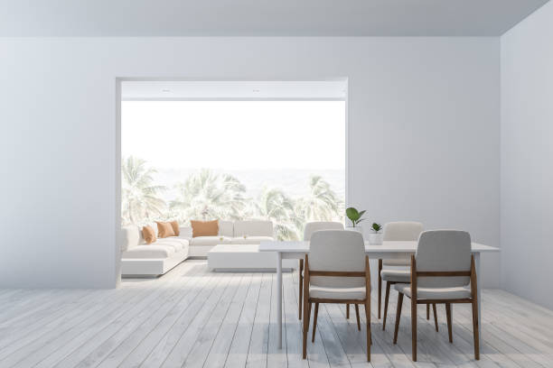 istock White dining room and living room interior 1169417300
