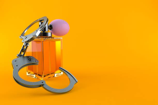 istock Perfume bottle with handcuffs 1169418306