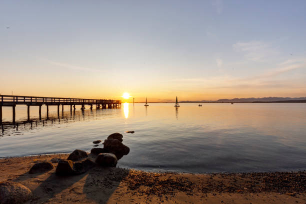 istock Beach and pier at sunset, Surrey, BC, Canada 1169424541