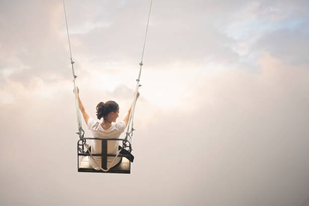 istock Female on Swing in the mountains. 1169426871