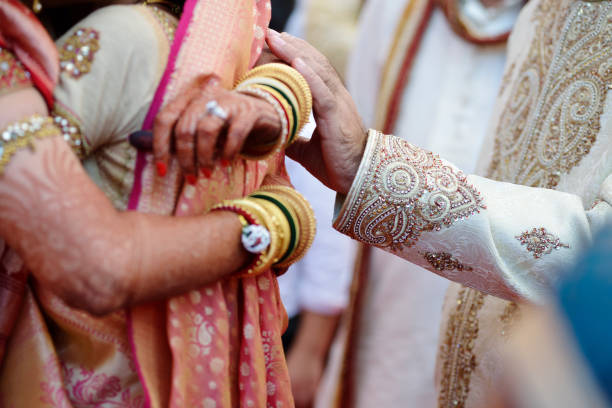 Goodbye or Bidai ceremony of a bride at wedding Parents saying goodbye to a bride at the end of indian wedding ceremony bride hugging father on wedding day stock pictures, royalty-free photos & images