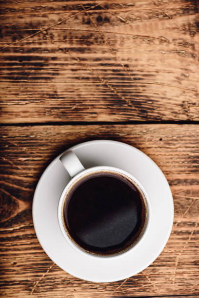 istock White cup of black coffee 1169431370