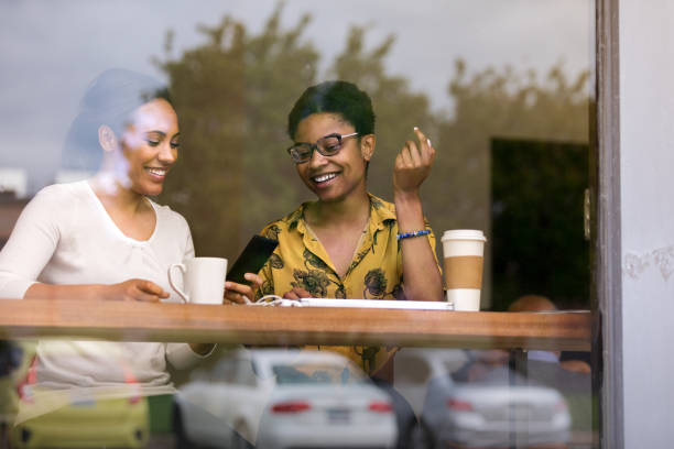 istock Friends enjoy coffee together 1169431474