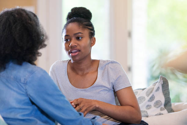 istock Vulnerable young woman asks mom for advice 1169431814