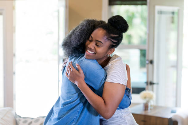 istock Young woman embracing her mom 1169431822