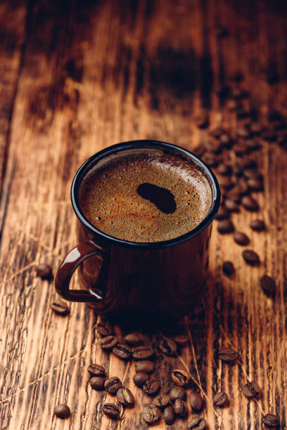 istock Brewed black coffee in metal mug 1169432735