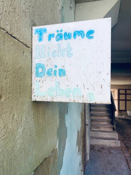 istock Don't dream your life sign on german language 1169433258