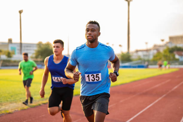 istock Athlete Man Preparing And Runs Hurdles for Track and Field 1169433408