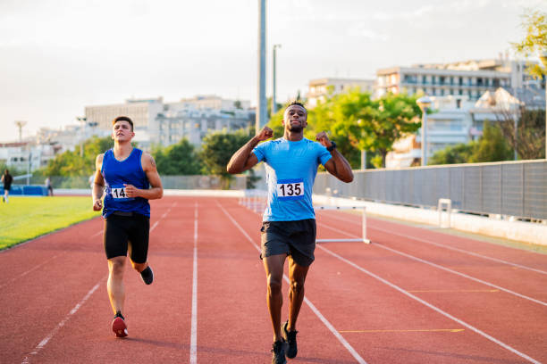 istock Athlete Man Preparing And Runs Hurdles for Track and Field 1169433410