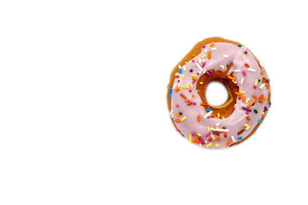 istock Donut with sprinkles isolated on white background - Image 1169433526