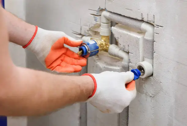 Photo of Installing a plug on the built-in faucet.