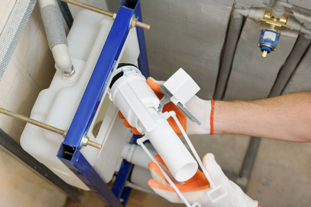 istock Installation of toilet siphon. 1169433578