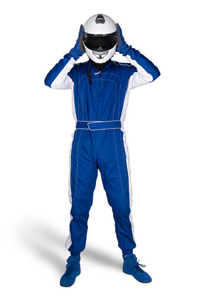 race driver in blue white motorsport overall shoes gloves and safety gear take off crash helmet after finish isolated white background. car racing motorcycle sport concept. - beautiful blue sport vertical imagens e fotografias de stock