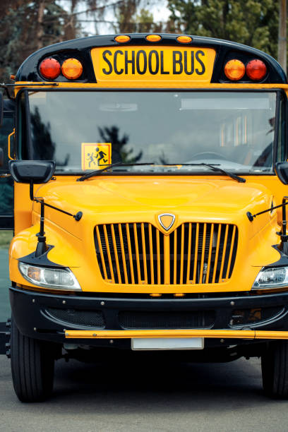 istock School bus sign above front window vertical close-up 1169437440
