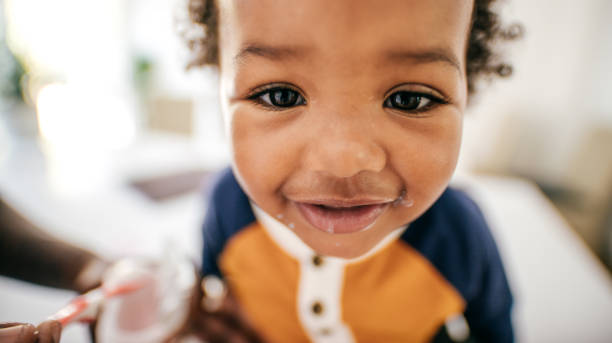 istock Toddler eating yogurt 1169440554