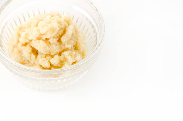 istock Grated ginger in Glass Bowl on white background 1169442182