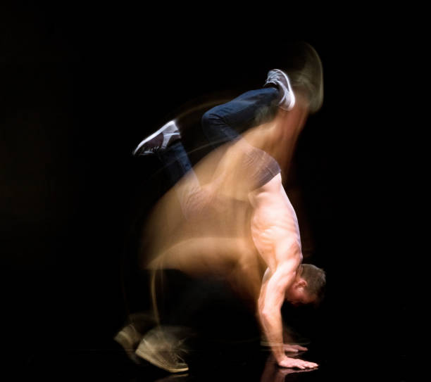 istock Shirtless man moving around with motion blur 1169443411