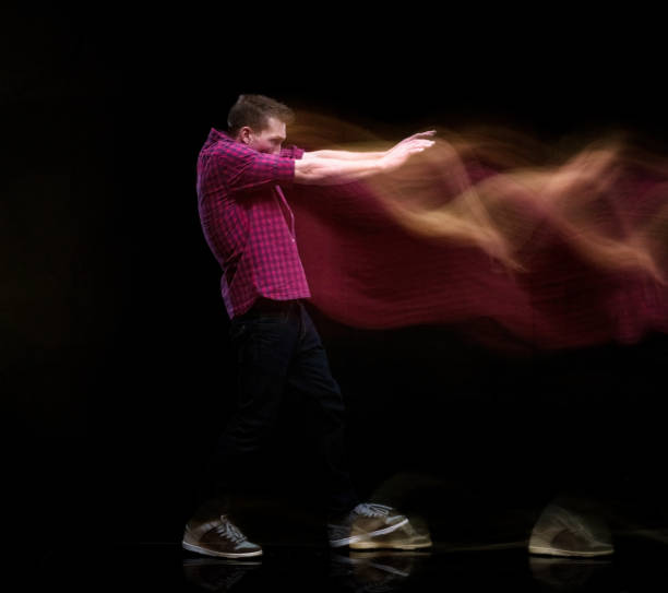 istock Handsome man in motion blur 1169443434