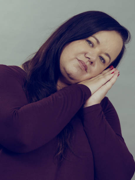 istock Woman being sleepy gesturing 1169444628