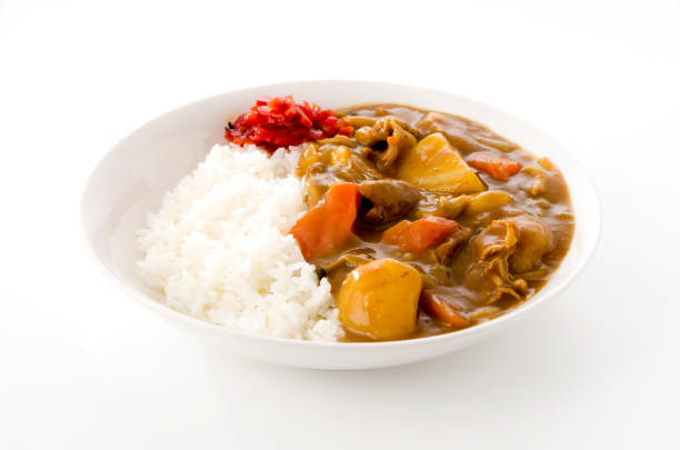 Japanese food, pork curry with rice on white background Japanese food, pork curry with rice on white background curry stock pictures, royalty-free photos & images