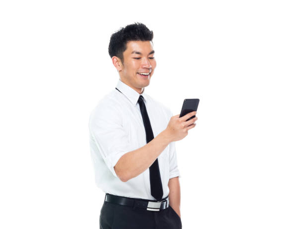 istock Handsome Asian Businessman - texting on smart phone 1169447405