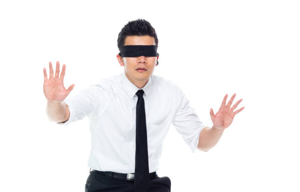 istock Handsome Asian Businessman - is wearing a blindfold 1169447519