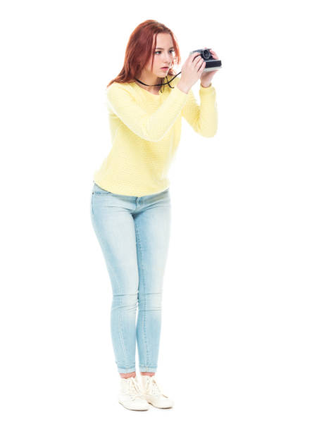 istock Female photographer 1169450131