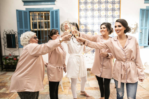 istock Bride and bridesmaid making a toast 1169459013