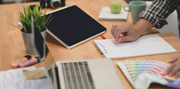 istock Graphic designer sketching on the paper 1169477772
