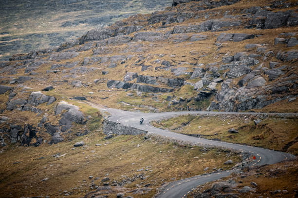istock Motorcyclist descends Healy Pass in Ireland 1169478111