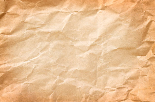 istock Old blank wrinkle light brown paper texture abstract top view for background , copy space 1169479104