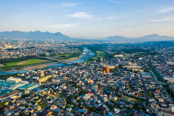Aerial drone photo - Sunrise over the city of Maebashi, Gunma Prefecture.  Japan, Asia Sunrise over beautiful Maebashi Japan.  Gunma Prefecture gunma prefecture stock pictures, royalty-free photos & images