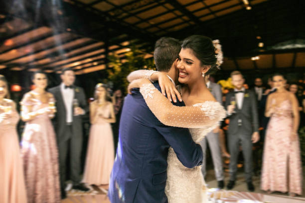 istock Bride and groom dancing their first dance 1169480859
