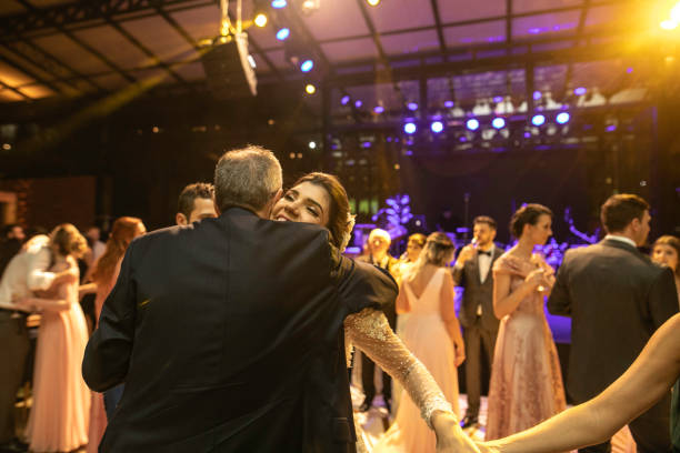 istock Rear view of a wedding guest congratulating the bride during reception 1169480901