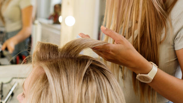 Creating hairstyle. stock photo