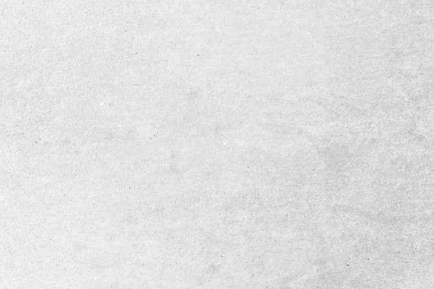 istock Modern grey paint limestone texture background in white light seam home wall paper. Back flat subway concrete stone table floor concept surreal granite quarry stucco surface background grunge pattern. 1169483036